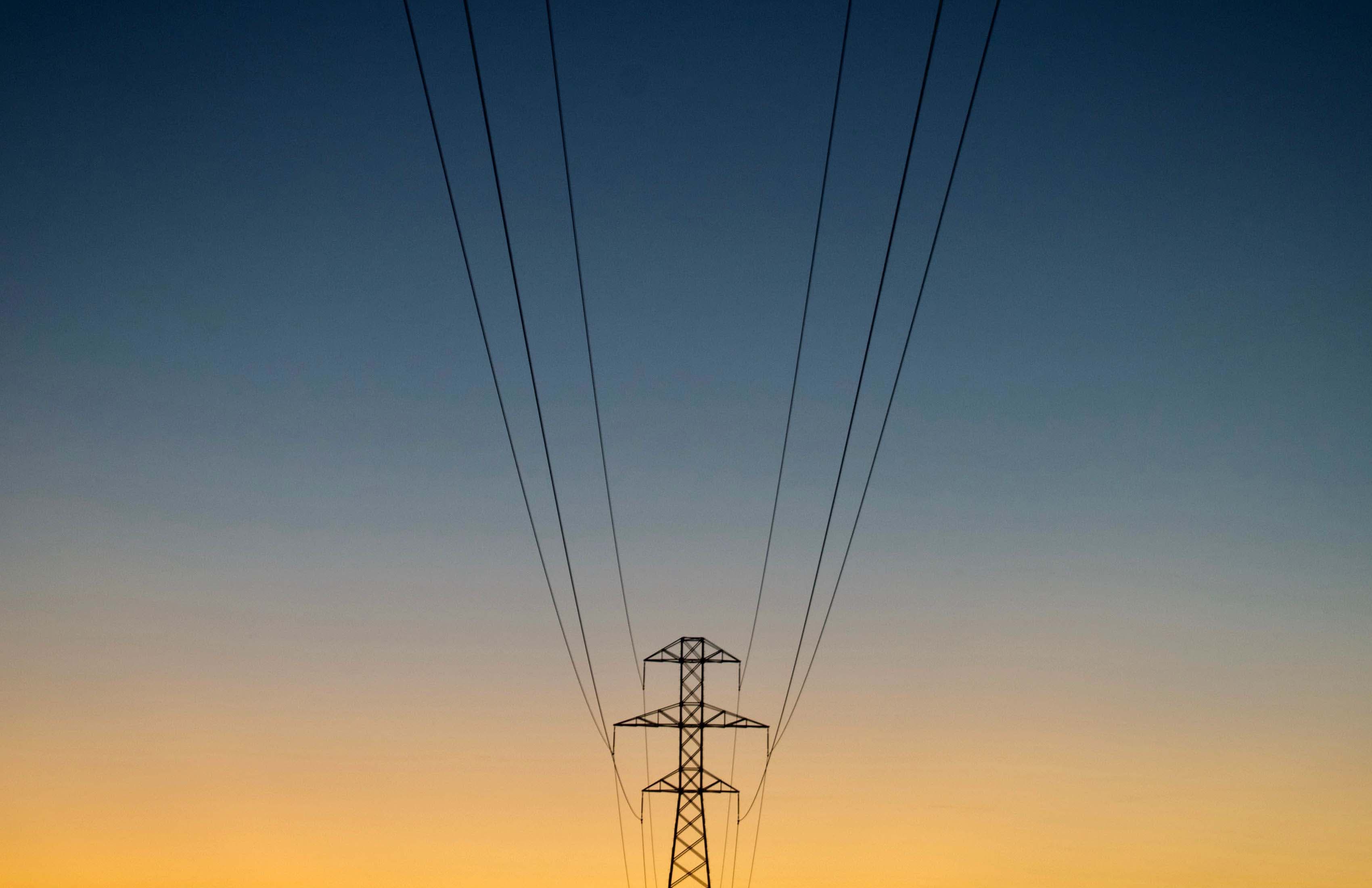 Power lines during sunset